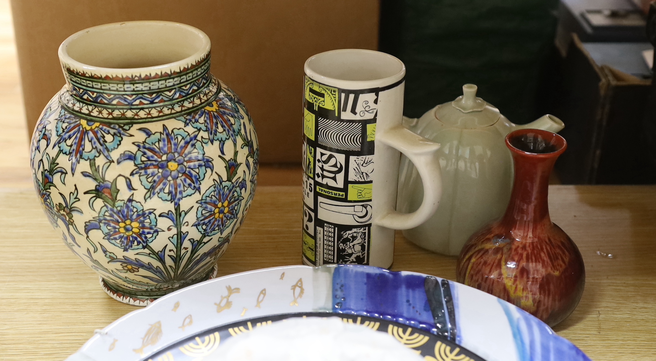 Assorted contemporary ornamental ceramics including chargers, celadon style teapot and vase decorated with stylised flowers, the largest 38cm in diameter